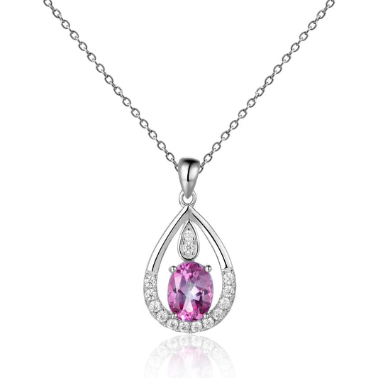 Teardrop-shaped pendant with pink gemstone and diamonds on a white background